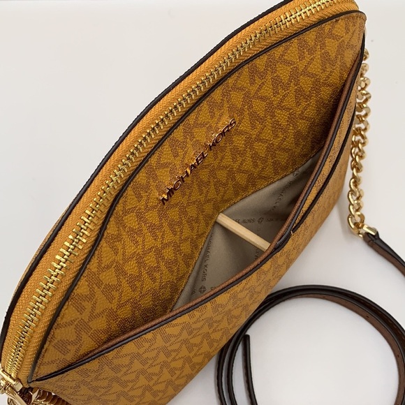 Michael Kors Medium Dome Xcross Xbody Bag
Color: Marigold Multi - Picture 9 of 15
